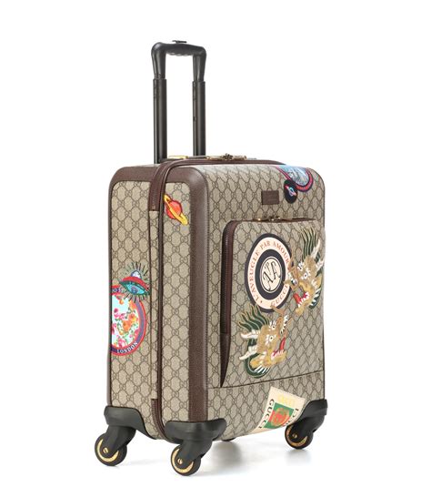 gucci supreme carry on suitcase|Gucci large luggage.